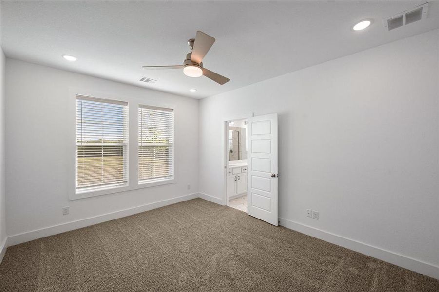 Primary bedroom with ensuite bathroom