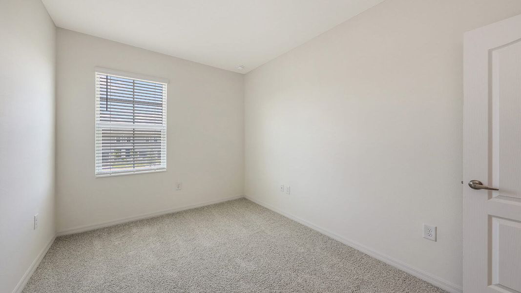 Spacious, unfurnished interior of a new home in Palm Grove Real Estate and Homes for Sale in Lakewood Ranch, FL - Neal Communities, Lakewood Ranch (Image 65).