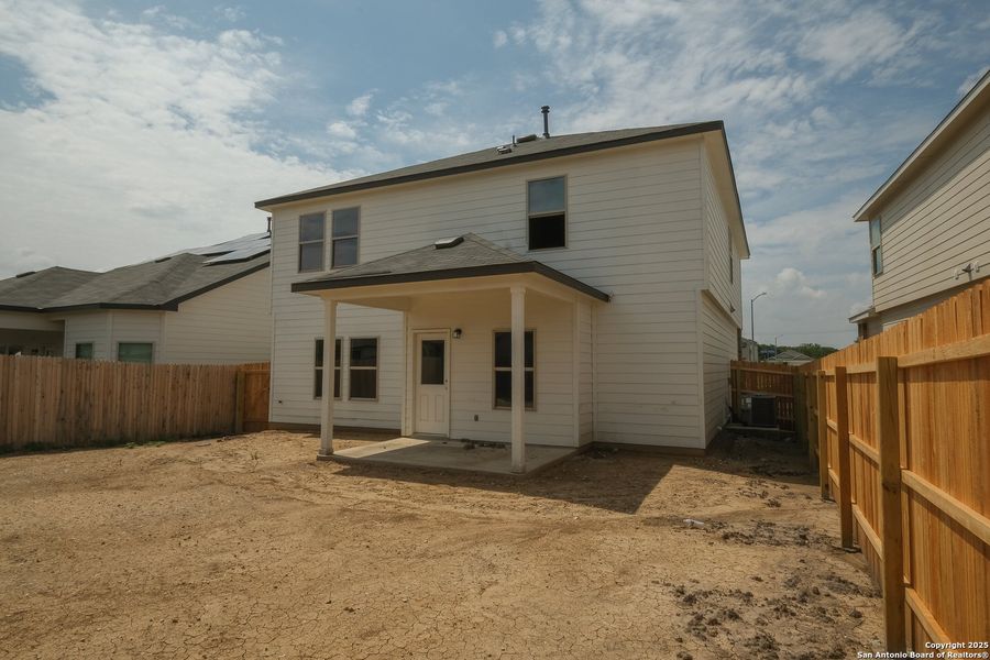 Front exterior of a new home in Blue Ridge Ranch, San Antonio, TX, highlighting curb appeal (Image 20). Front exterior of a new home in Blue Ridge Ranch, San Antonio, TX, highlighting curb appeal (Image 20).