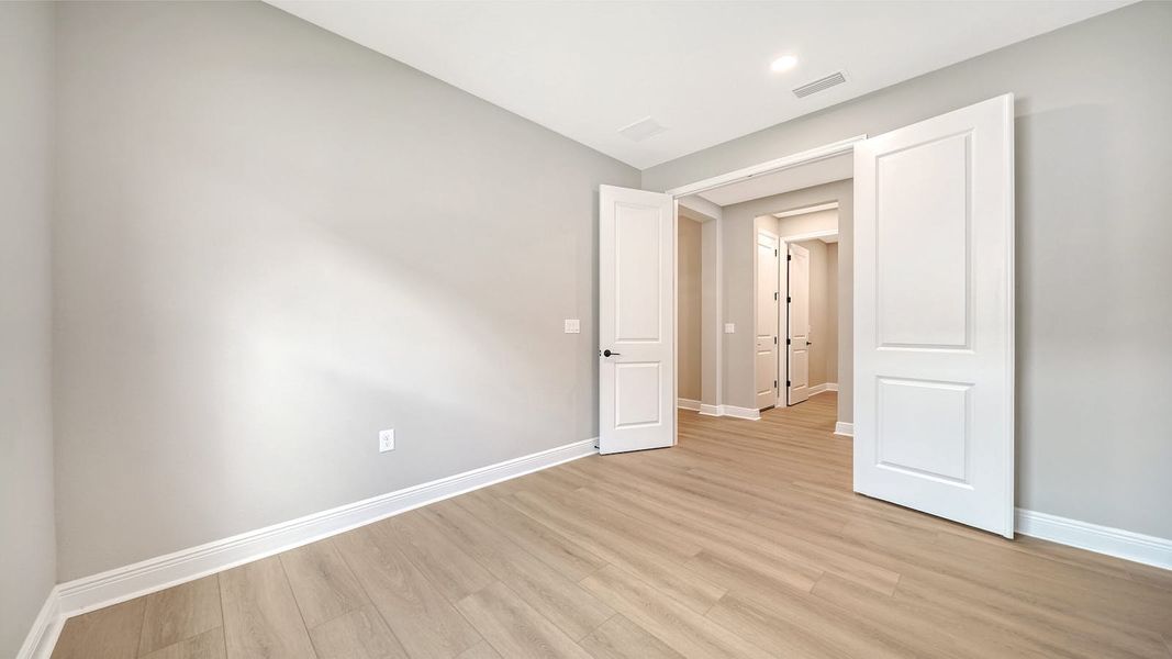 Spacious, unfurnished interior of a new home in Windward Real Estate and Homes for Sale in Sarasota, FL - Neal Communities, Lakewood Ranch (Image 42).