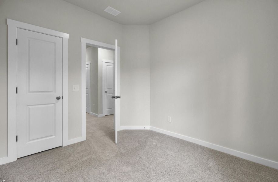 Spacious, unfurnished interior of a new home in Indigo Grove Townhomes, Johns Island (Image 31).
