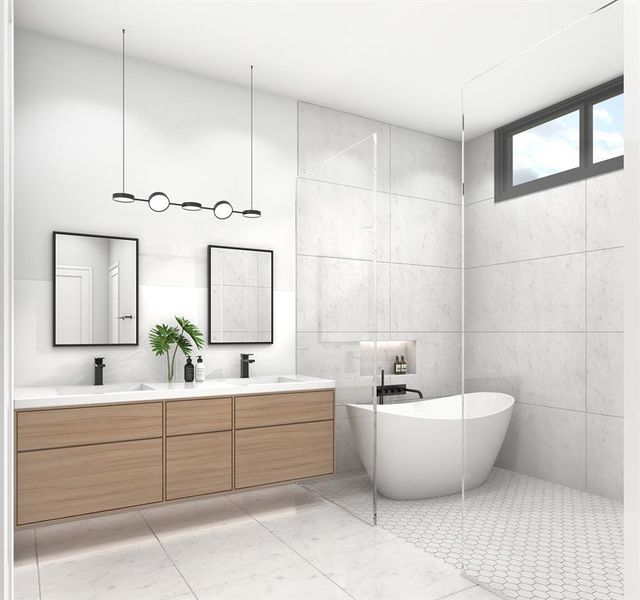 Full bath featuring tile walls, double vanity, a freestanding tub, and light tile patterned flooring