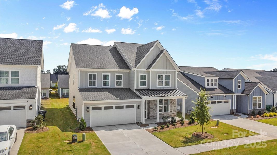 Front exterior of a new home in , Charlotte, NC, highlighting curb appeal (Image 18).