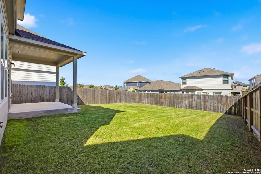 Exterior details and patio area of a home in Abbott Place, St. Hedwig (Image 30).