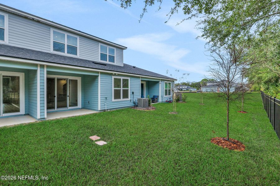 Exterior details and patio area of a home in The Hammock at Palm Harbor, Palm Coast (Image 23).