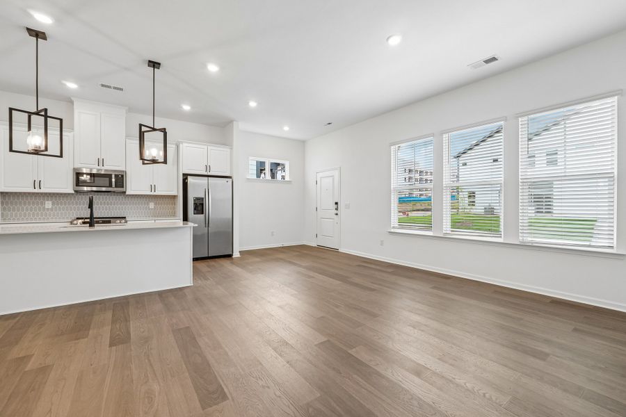 Spacious, unfurnished interior of a new home in Terraces at the Exchange, Indian Land (Image 15).
