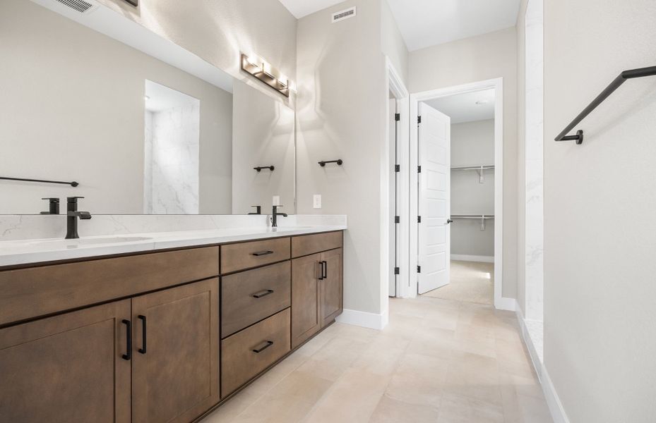 Furnished interior view inside a new home in Hilltop at Inspiration, Aurora (Image 13).