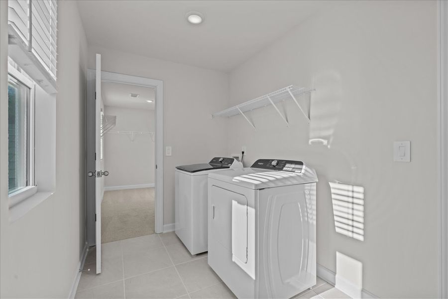 Furnished interior view inside a new home in The Farm at Wells Creek - Signature Collection, Gray Court (Image 8).