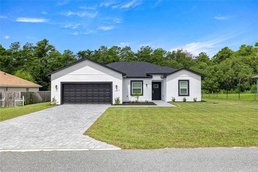 Front exterior of a new home in , Ocala, FL, highlighting curb appeal (Image 22).