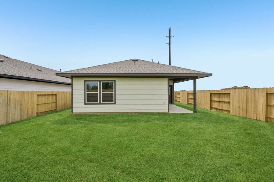 Exterior details and patio area of a home in Azalea, Pattison (Image 18).