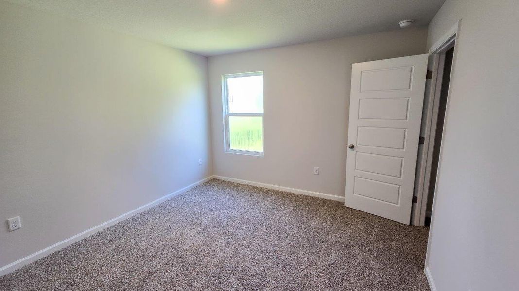 Spacious, unfurnished interior of a new home in Misting Springs, Crawfordville (Image 12).