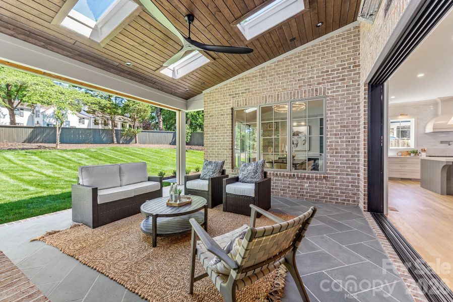 Porch with skylights, heaters and retractable screens