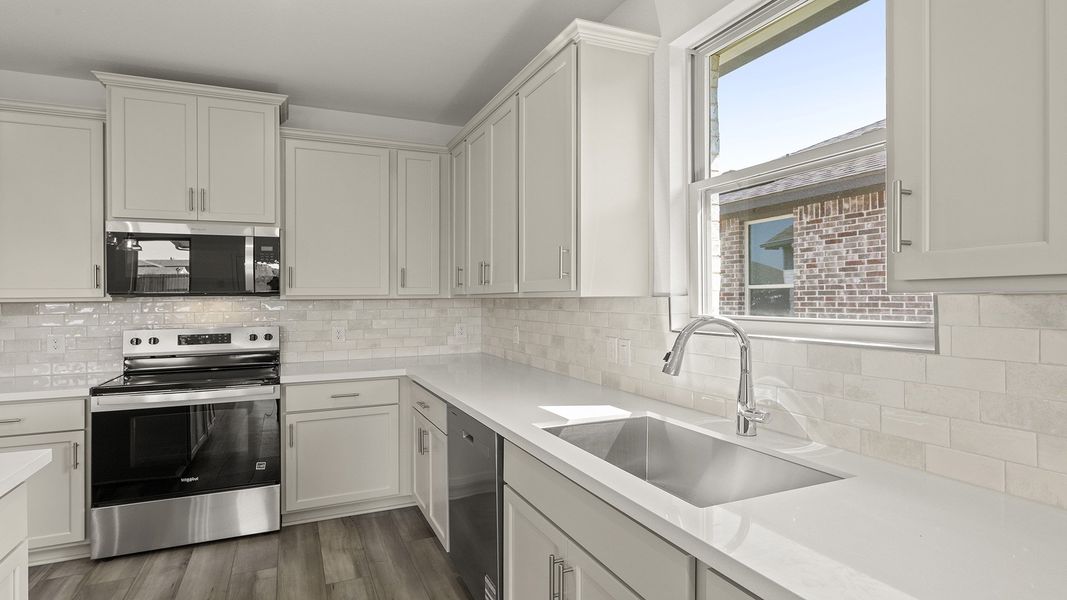 Furnished interior view inside a new home in Churchill 50s, Anna (Image 11). Furnished interior view inside a new home in Churchill 50s, Anna (Image 11).