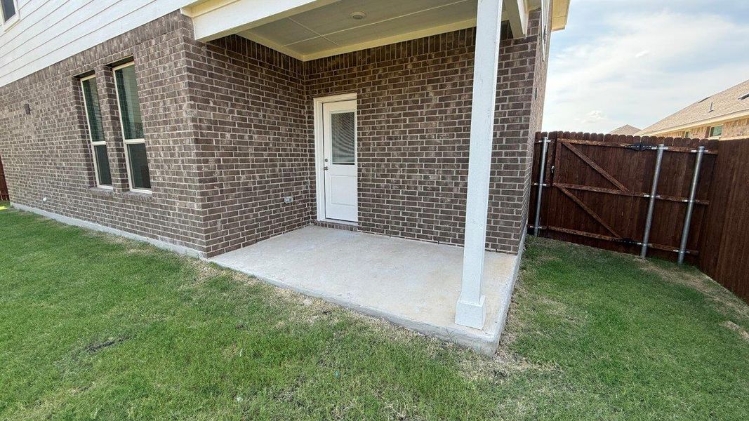 Exterior details and patio area of a home in Saratoga, Granbury (Image 2). Exterior details and patio area of a home in Saratoga, Granbury (Image 2).
