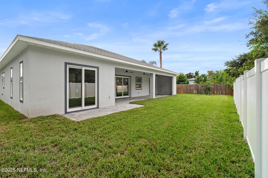 Front exterior of a new home in , Palm Coast, FL, highlighting curb appeal (Image 32). Front exterior of a new home in , Palm Coast, FL, highlighting curb appeal (Image 32).