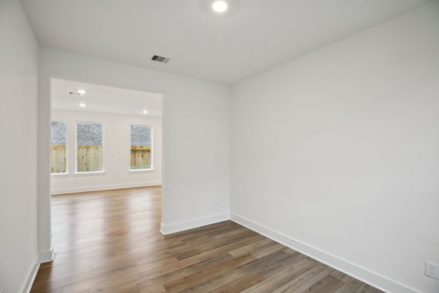 Spacious, unfurnished interior of a new home in The Cottages Collection at Oakberry Trails, Waller (Image 6). Spacious, unfurnished interior of a new home in The Cottages Collection at Oakberry Trails, Waller (Image 6).