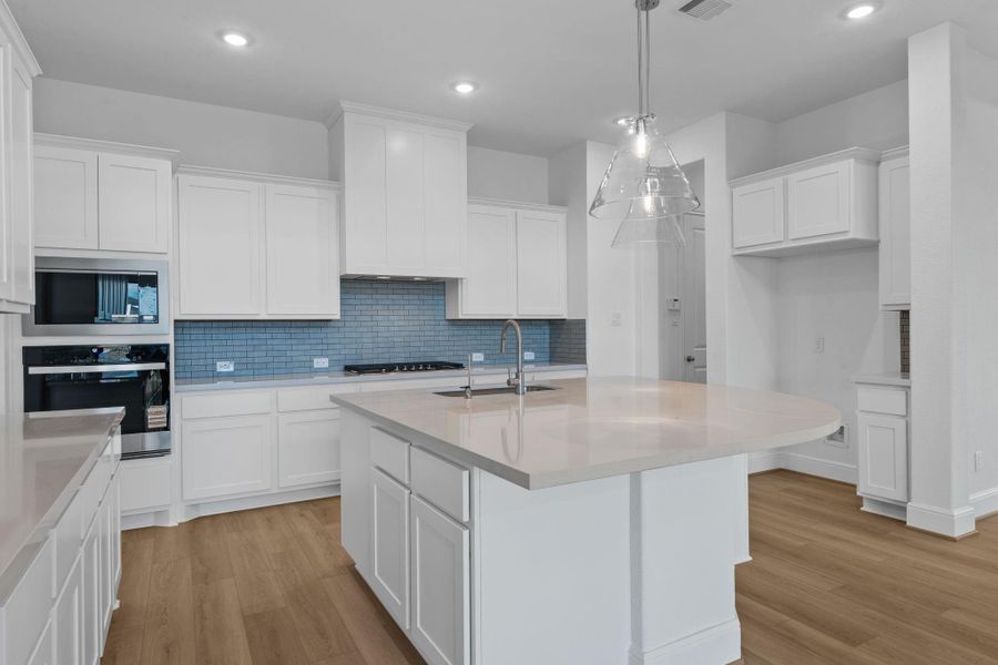 Furnished interior view inside a new home in Dunham Pointe 70', Cypress (Image 12).