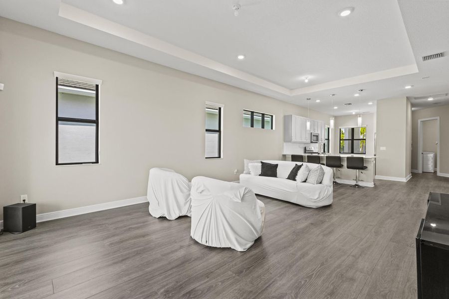 Furnished interior view inside a new home in , The Acreage (Image 25).