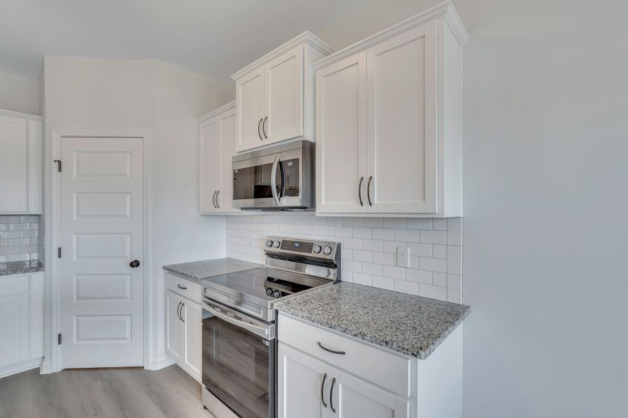 Representative furnished interior of a home built from the The Norman by RTS Homes in Doctor's Creek, Ludowici (Image 7).