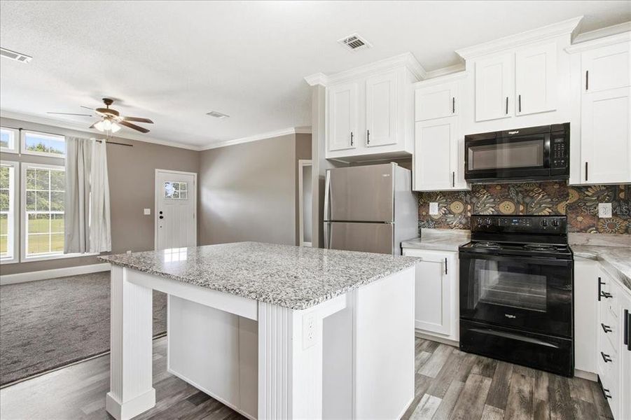 Furnished interior view inside a new home in , Bushnell (Image 5).