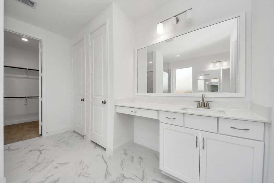 Furnished interior view inside a new home in ARTAVIA, Conroe (Image 9).