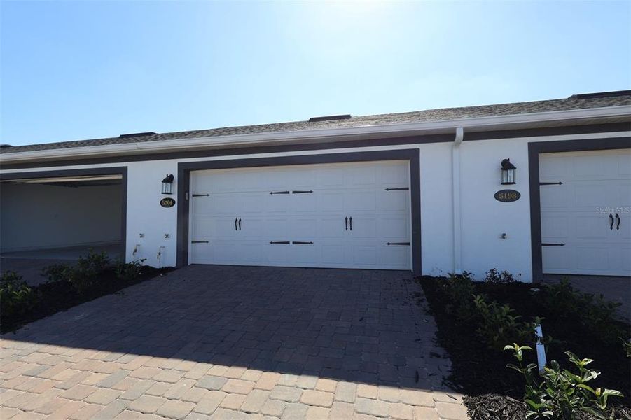 Exterior details and patio area of a home in Center Lake on the Park, St. Cloud (Image 4).