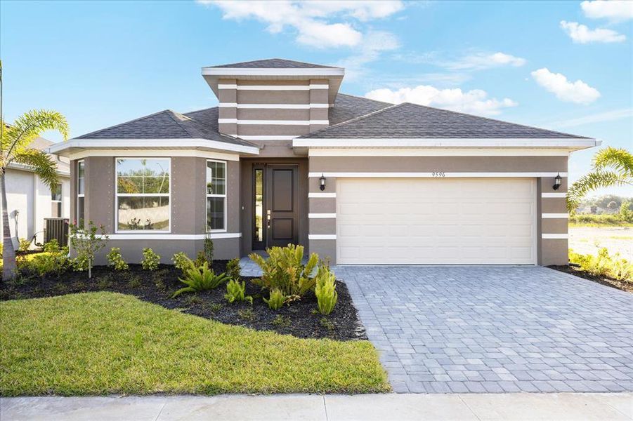 Front exterior of a new home in , Venice, FL, highlighting curb appeal (Image 1).