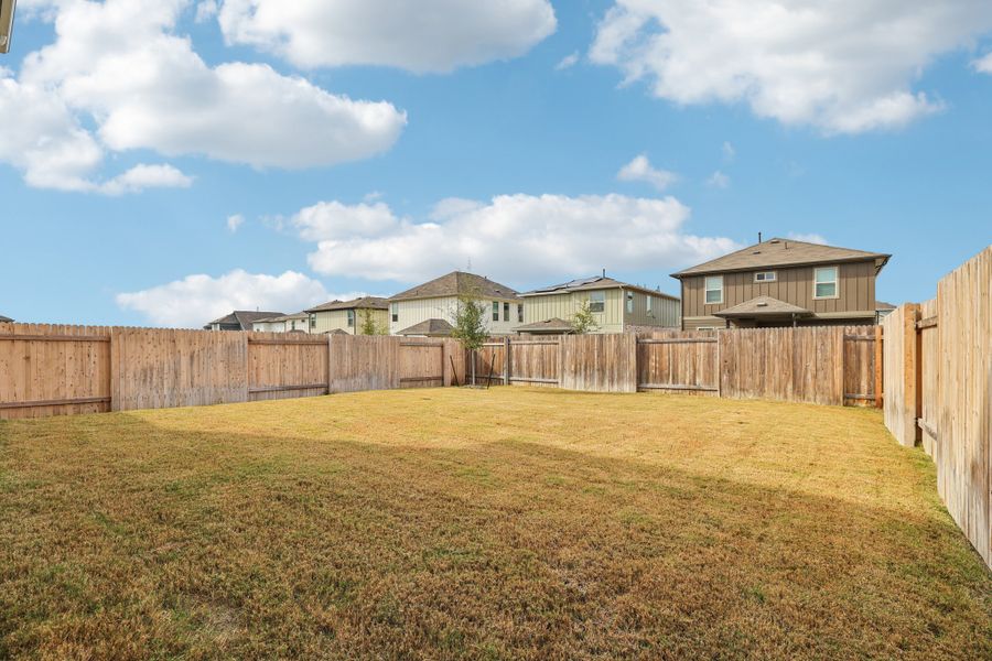 Exterior details and patio area of a home in Crosswinds, Kyle (Image 3).