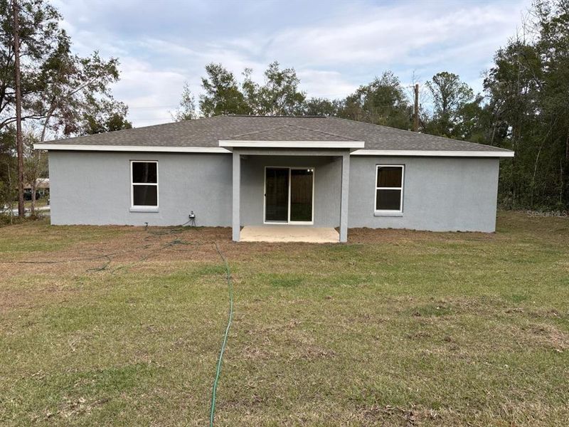 Exterior details and patio area of a home in , Citrus Springs (Image 19).