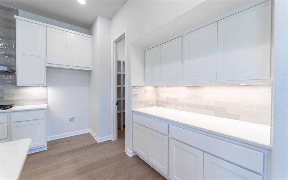Furnished interior view inside a new home in Heath Golf & Yacht Club, Heath (Image 12).