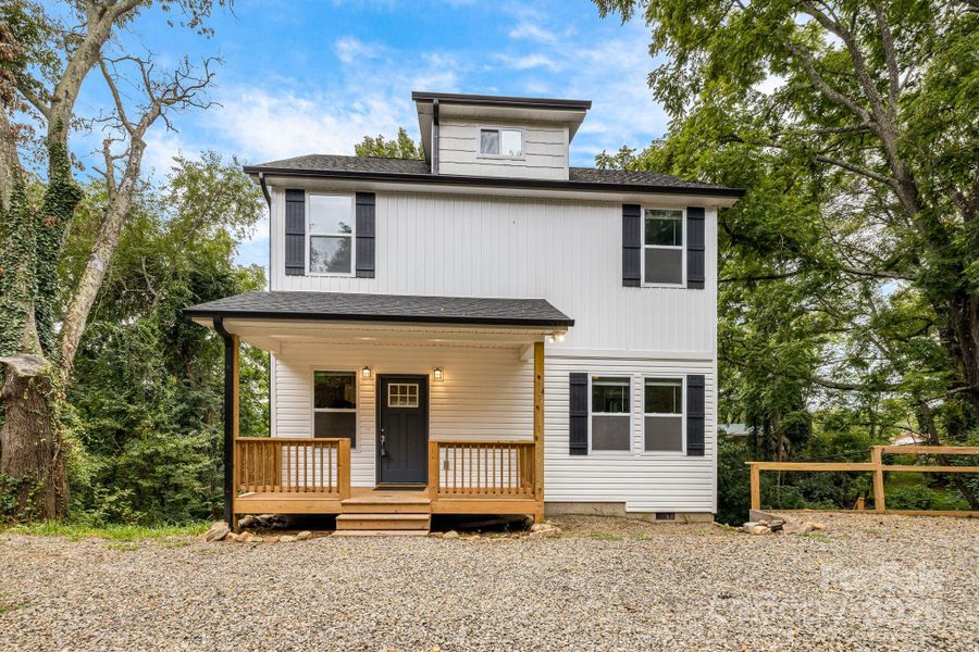 Front exterior of a new home in , Asheville, NC, highlighting curb appeal (Image 27).
