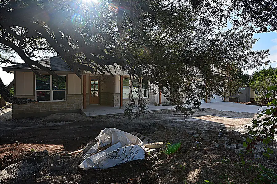 Front exterior of a new home in , Fischer, TX, highlighting curb appeal (Image 1). Front exterior of a new home in , Fischer, TX, highlighting curb appeal (Image 1).