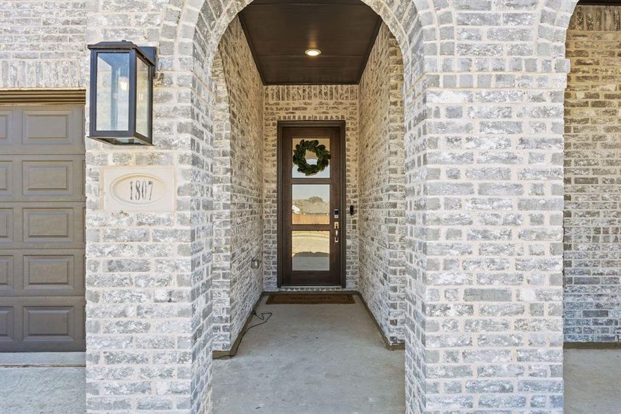 Exterior details and patio area of a home in Thompson Farms: 50ft. lots, Van Alstyne (Image 3).