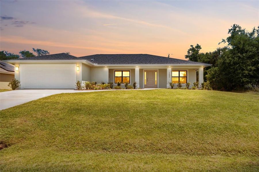 Front exterior of a new home in , Englewood, FL, highlighting curb appeal (Image 2). Front exterior of a new home in , Englewood, FL, highlighting curb appeal (Image 2).