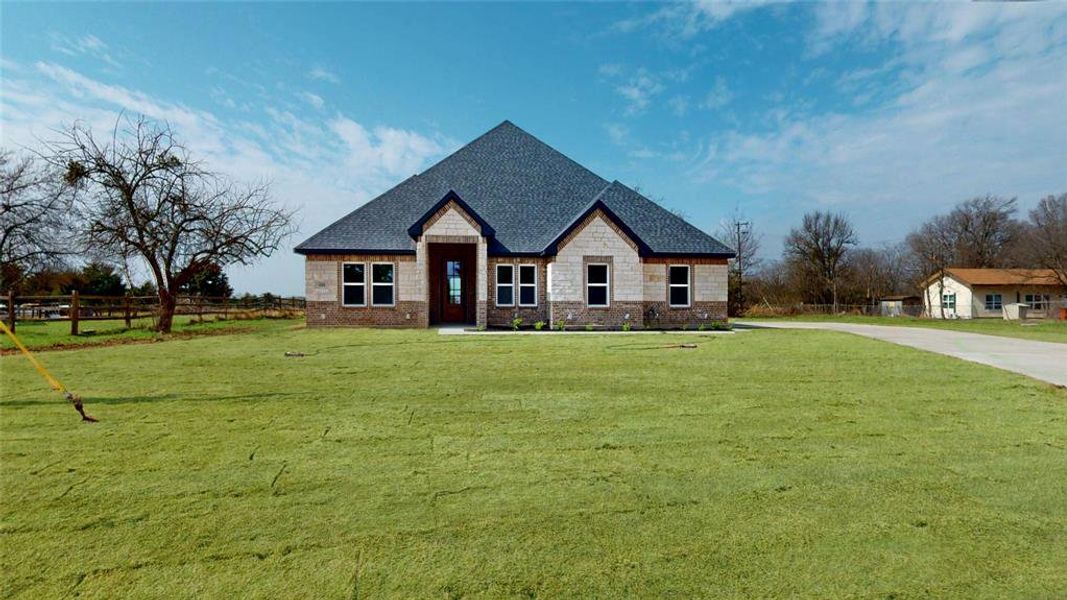 Front exterior of a new home in , Greenville, TX, highlighting curb appeal (Image 20).