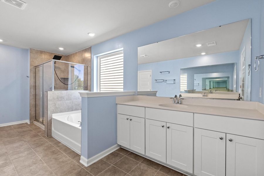 Furnished interior view inside a new home in Sweetgrass at Summers Corner, Summerville (Image 37).