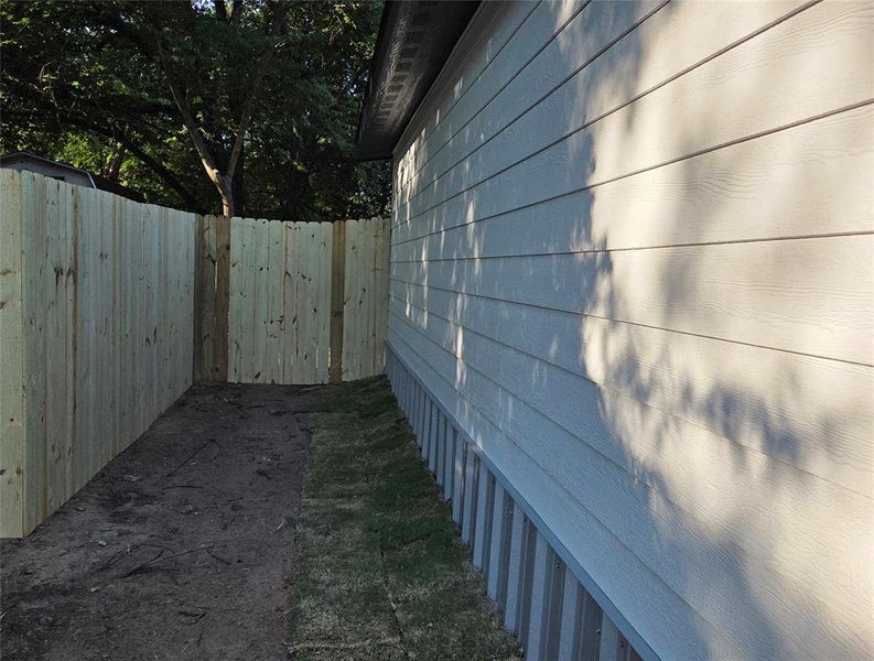 West Side of Home with New Fence. West Side of Home with New Fence.
