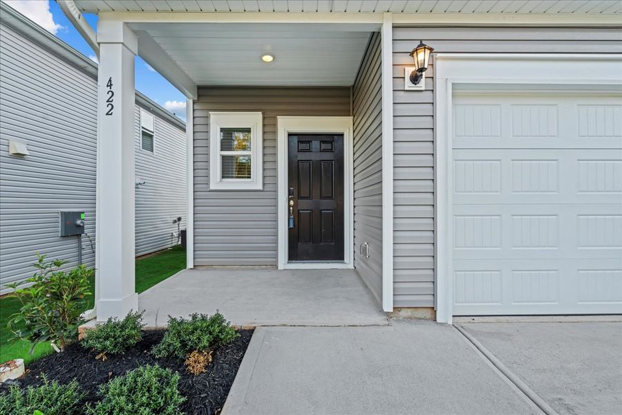Exterior details and patio area of a home in The Farm at Wells Creek - Heritage Collection, Gray Court (Image 3). Exterior details and patio area of a home in The Farm at Wells Creek - Heritage Collection, Gray Court (Image 3).