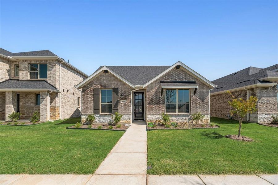 Front exterior of a new home in Arbors at Legacy Hills, Celina, TX, highlighting curb appeal (Image 1). Front exterior of a new home in Arbors at Legacy Hills, Celina, TX, highlighting curb appeal (Image 1).
