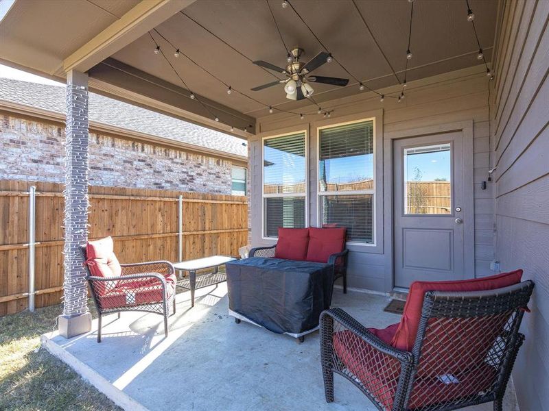 View of patio / terrace with an outdoor living space and ceiling fan