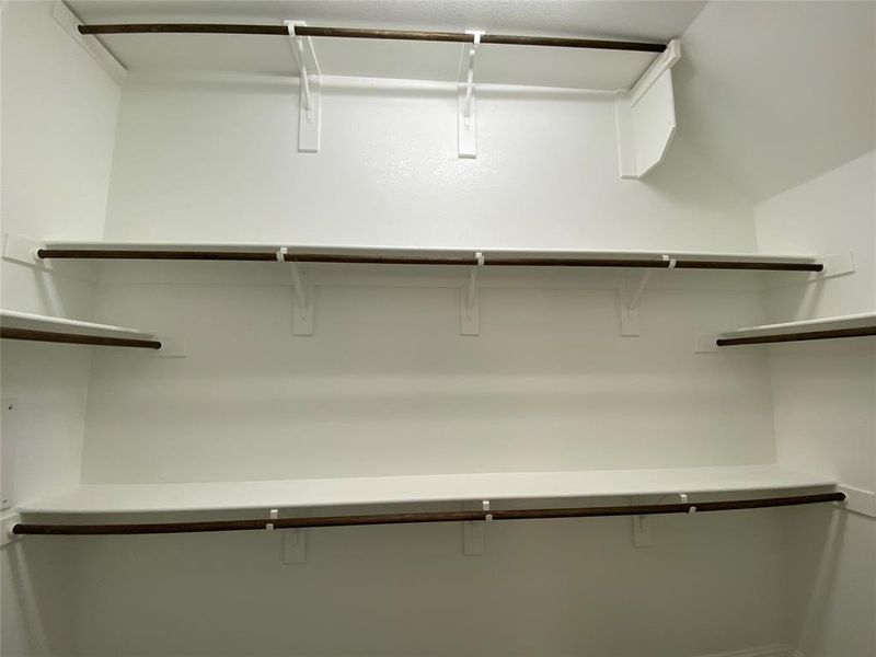 Large master closet has 3rd rail for seasonal storage Large master closet has 3rd rail for seasonal storage