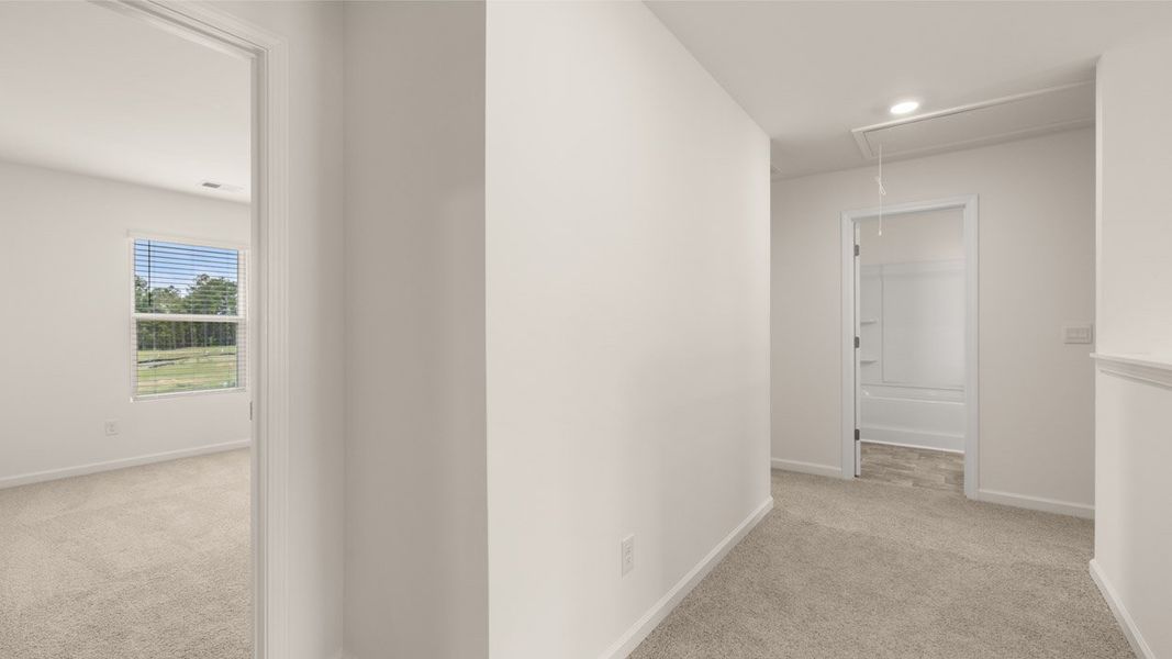 Representative unfurnished interior of a home built from the Packard by D.R. Horton in Glenmaye, Hampton (Image 24).