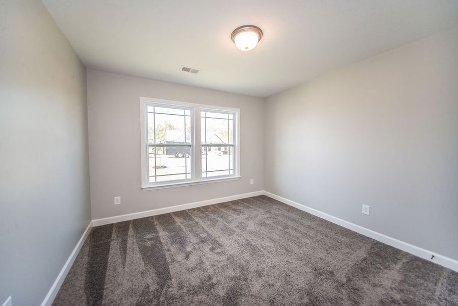 Representative unfurnished interior of a home built from the Archer by Enchanted Homes in Lonesome Dove, San Antonio (Image 38).