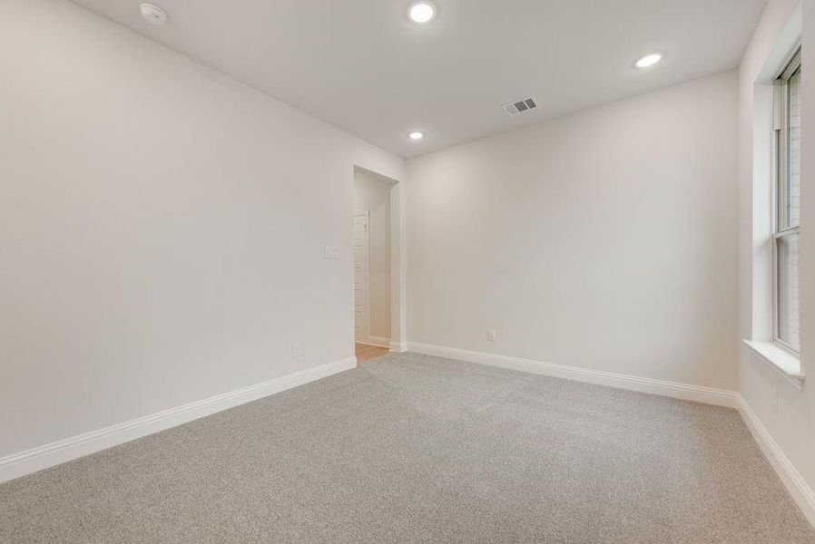 Spacious, unfurnished interior of a new home in Valencia On The Lake, Little Elm (Image 13).