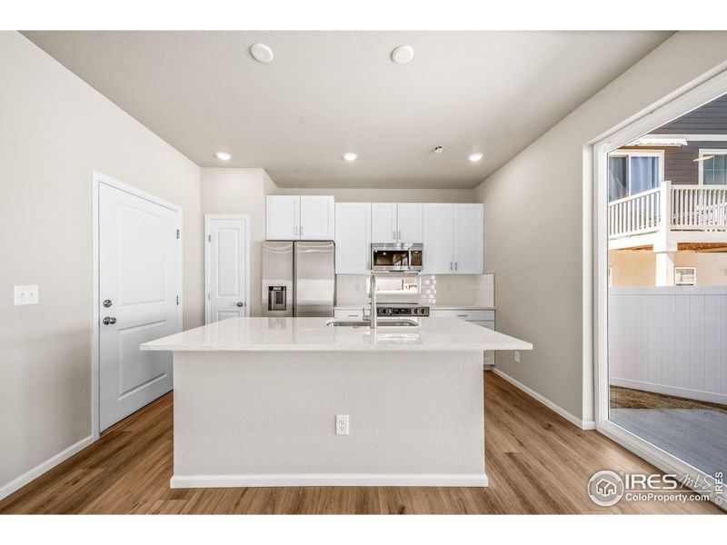 Furnished interior view inside a new home in Thompson River Ranch, Johnstown (Image 10).