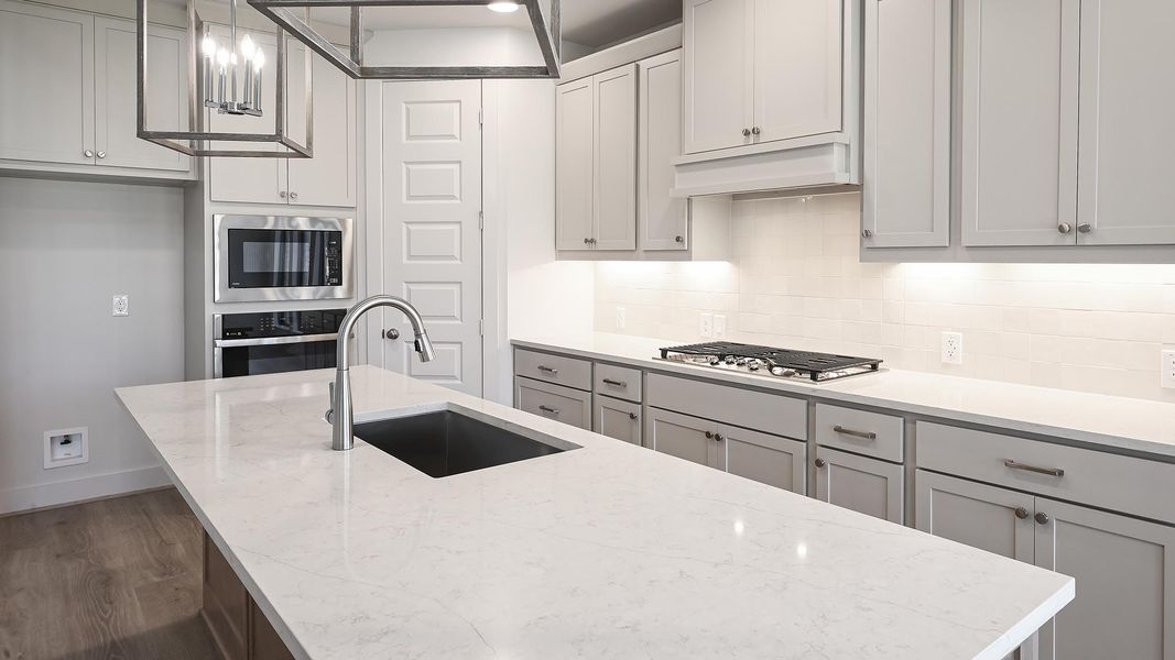 Furnished interior view inside a new home in 6 Creeks, Kyle (Image 4).