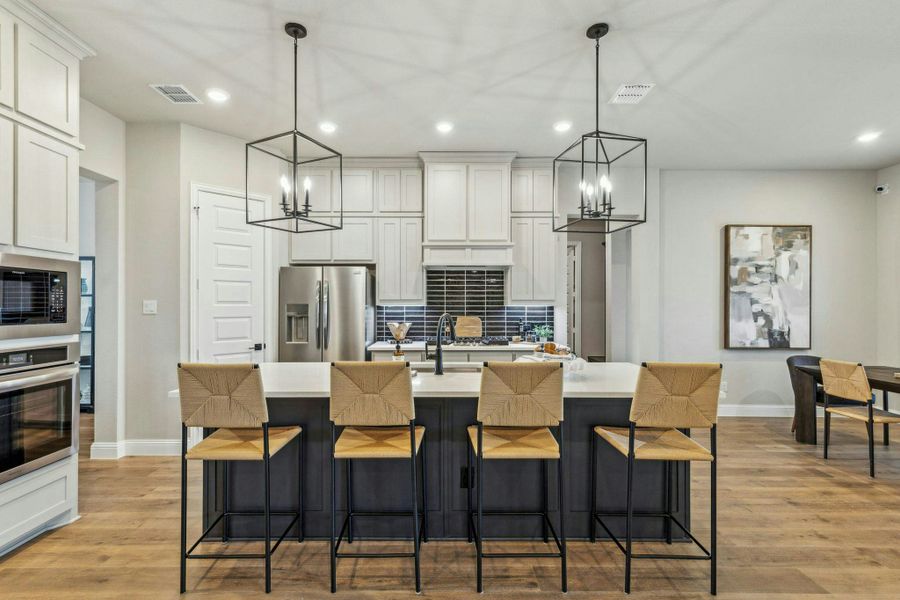 Representative furnished interior of a home built from the Reid by Kindred Homes in Heritage, McLendon-Chisholm (Image 11).