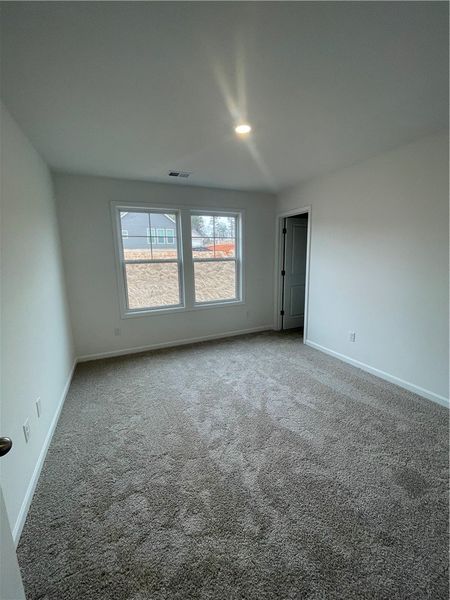 Spacious, unfurnished interior of a new home in Springwood Grove, Central (Image 19).