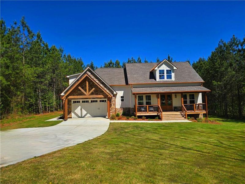 Front exterior of a new home in , Temple, GA, highlighting curb appeal (Image 25).