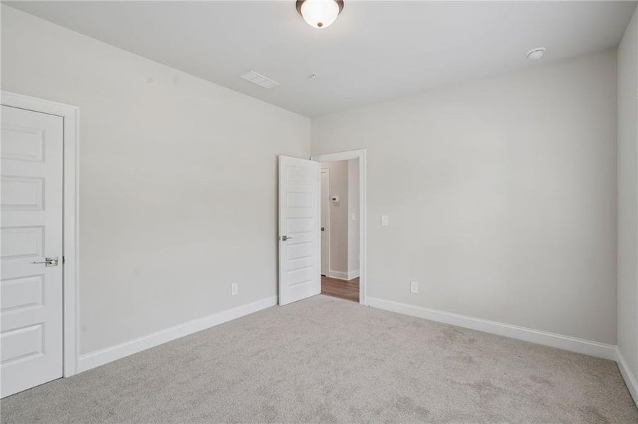 Spacious, unfurnished interior of a new home in Hemingway - Highland Series, Cumming (Image 39). Spacious, unfurnished interior of a new home in Hemingway - Highland Series, Cumming (Image 39).